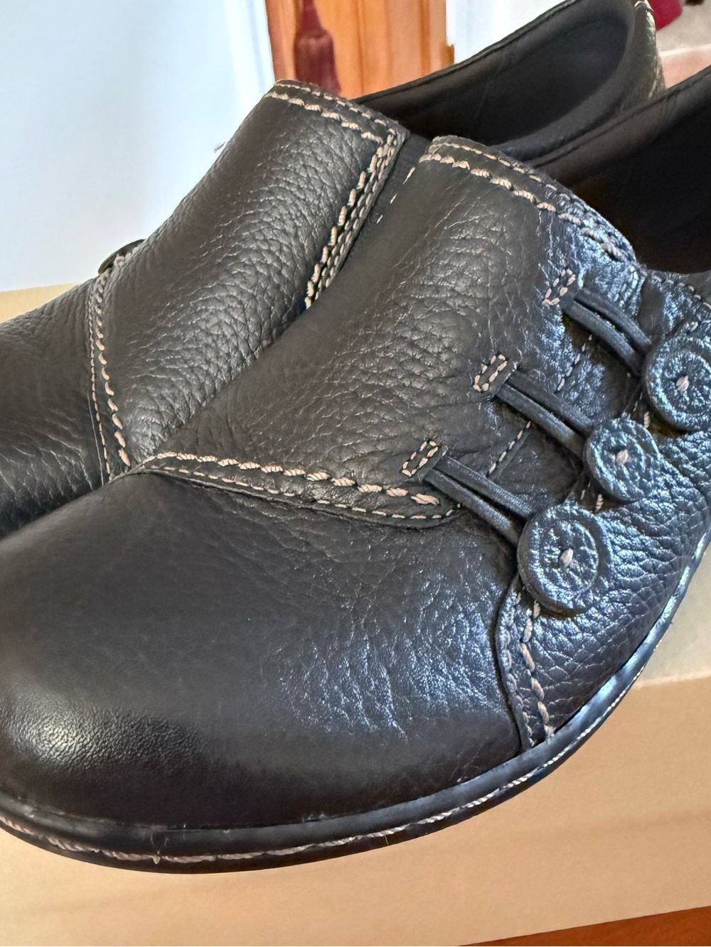 Clarks Black Leather Women's Slip-On Loafers with Decorative Buttons